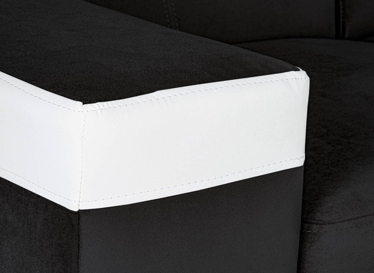 Canapé d'angle convertible réversible en velours noir et simili blanc LEONIE - DécoInParis