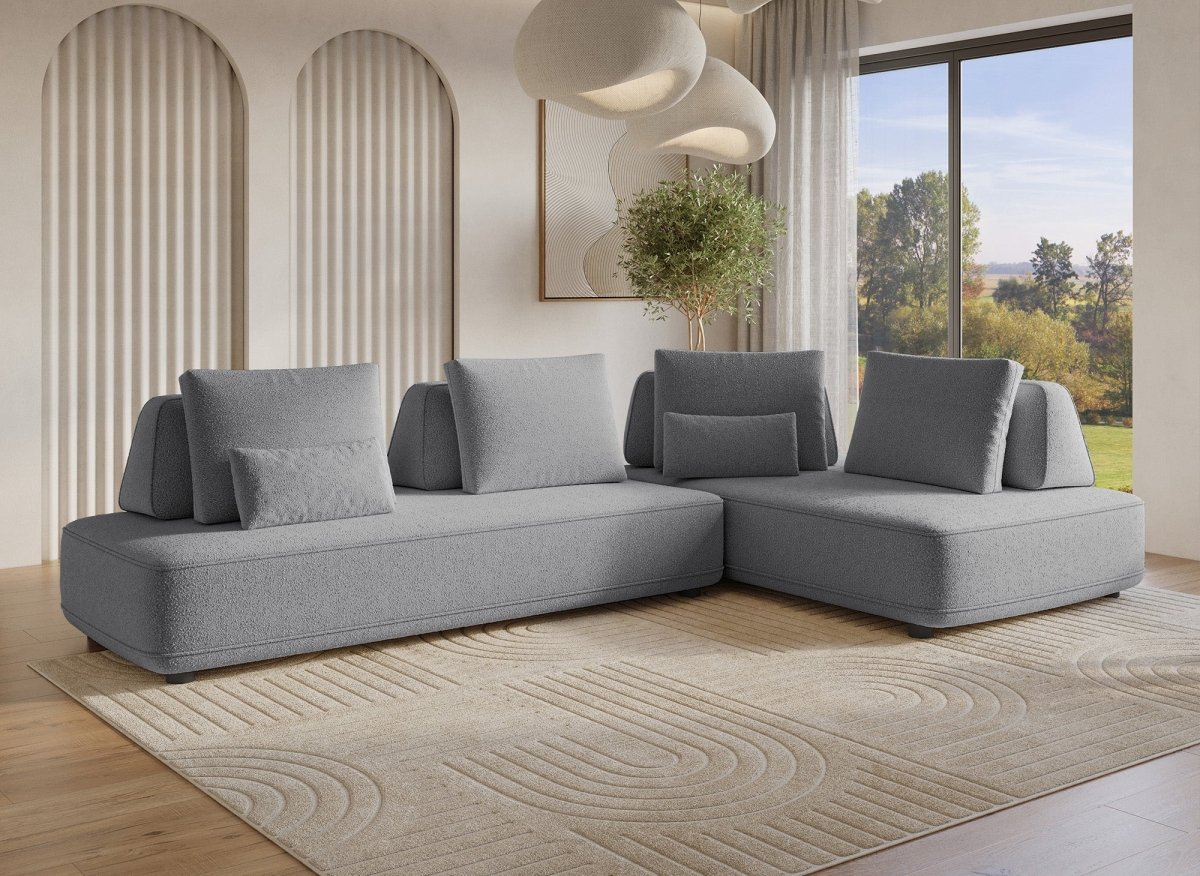 Canapé d'angle réversible en tissu bouclette gris ISAORA - DécoInParis