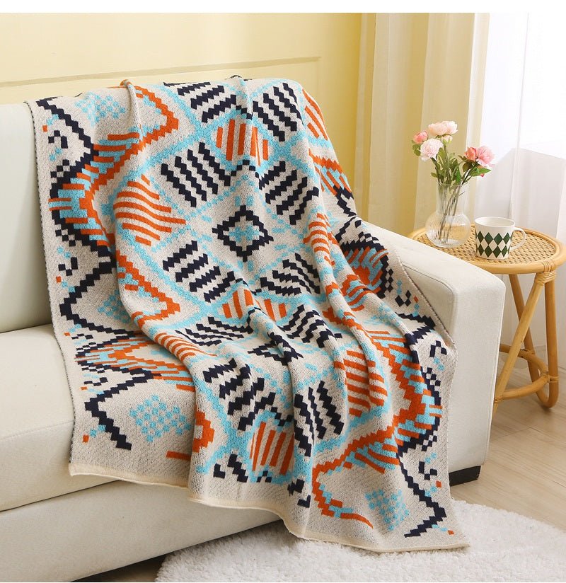 Plaid beige à motifs aztèques bleus et orange 130 x 180 cm NORDIK - DécoInParis