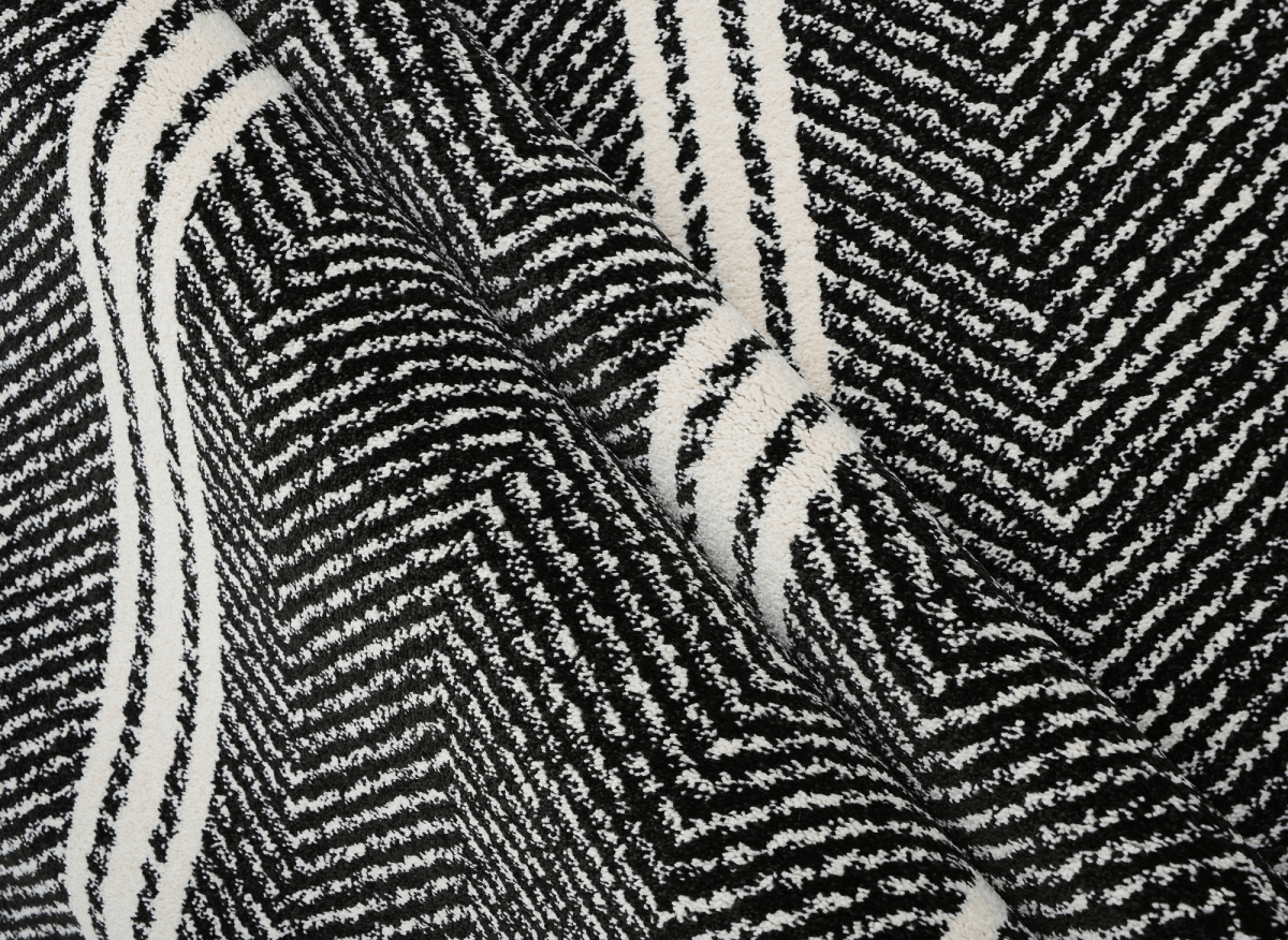 Tapis noir à motifs chevrons blancs 160 x 230 cm AIDA - DécoInParis